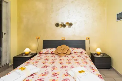 Letto o letti in una camera di VICOLO 55 Guest House