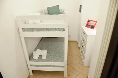 Letto o letti in una camera di Jama Maison Garden