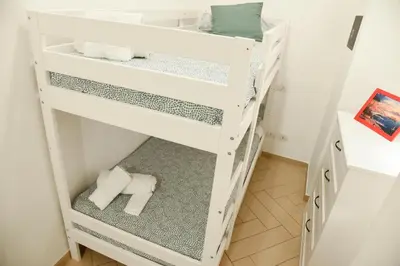 Letto o letti in una camera di Jama Maison Garden