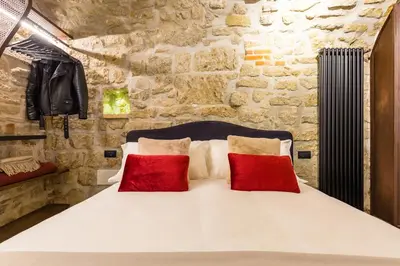 Letto o letti in una camera di Il Basso Napoletano di Candidella al Purgatorio By Dimorra