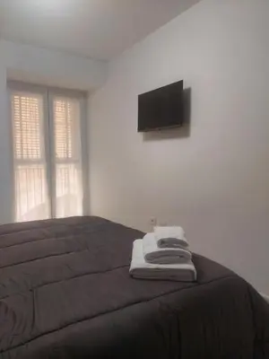 Letto o letti in una camera di Nel cuore di Angela