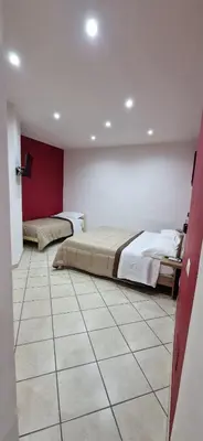 Letto o letti in una camera di Domus Pisanelli