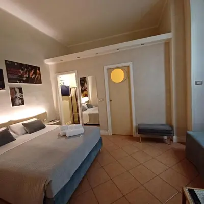 Letto o letti in una camera di Domus Duomo B&B Napoli