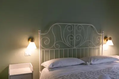 Letto o letti in una camera di Palazzo del Principe San Severo 3 bedrooms & Terrace!