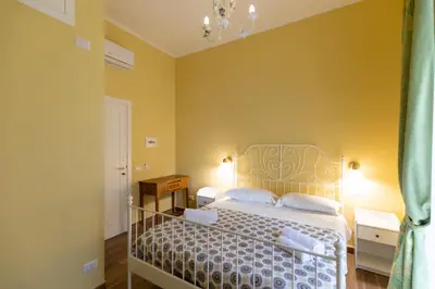 Letto o letti in una camera di Palazzo del Principe San Severo 3 bedrooms & Terrace!