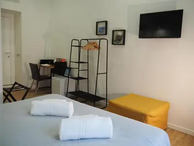 Letto o letti in una camera di Plan B B&B