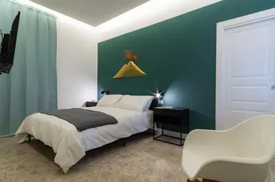 Letto o letti in una camera di Naos