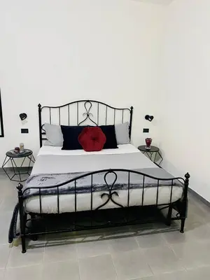 Letto o letti in una camera di Figurari Home Napoli-2