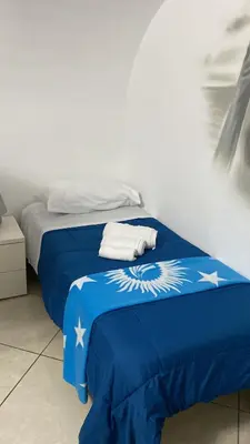Letto o letti in una camera di Lucia a Mare