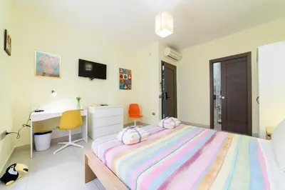 Letto o letti in una camera di Casa Gifuni