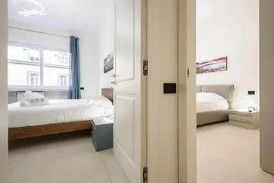 Letto o letti in una camera di Tommaseo Sea View Apartments