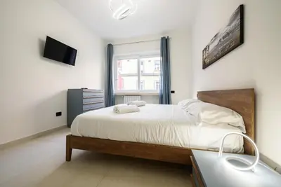 Letto o letti in una camera di Tommaseo Sea View Apartments