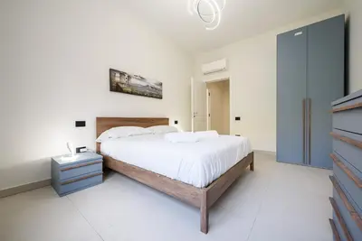 Letto o letti in una camera di Tommaseo Sea View Apartments