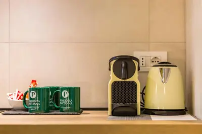 Set per la preparazione di tè e caffè presso Residenza Partanna by Napoliapartments