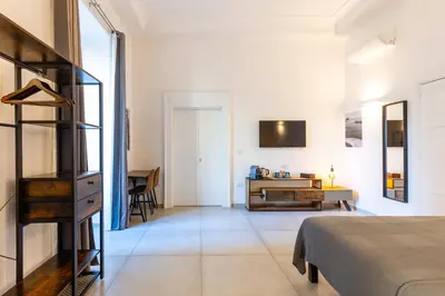 TV o dispositivi per l'intrattenimento presso Residenza Partanna by Napoliapartments