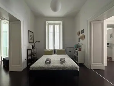 Letto o letti in una camera di Casa Vintage Napoli