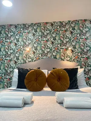 Letto o letti in una camera di Domus Leone