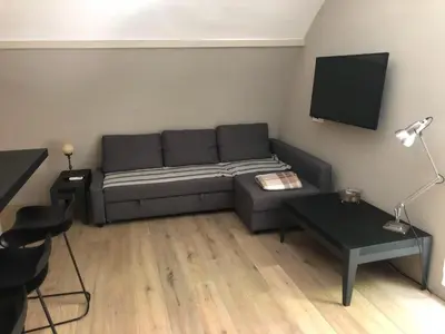 Area soggiorno di Super Design Appartamento Napoli Centro con Sky wifi veloce e Netflix