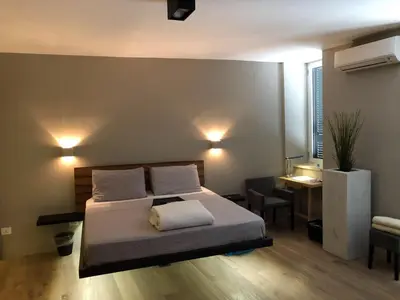 Letto o letti in una camera di Super Design Appartamento Napoli Centro con Sky wifi veloce e Netflix