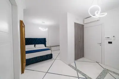 Letto o letti in una camera di Apart Hotel Suite Italy Naples Chiaia Mergellina