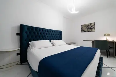 Letto o letti in una camera di Apart Hotel Suite Italy Naples Chiaia Mergellina