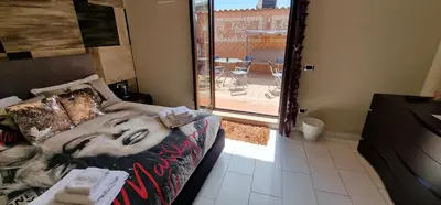 Letto o letti in una camera di Fashion House Napoli