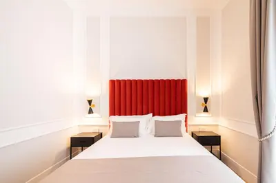 Letto o letti in una camera di Cortese Suite