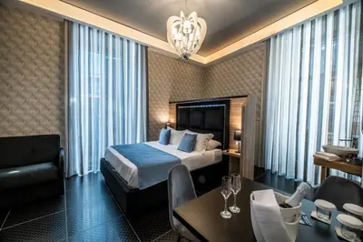 Letto o letti in una camera di Sole Luxury Bed and Breakfast