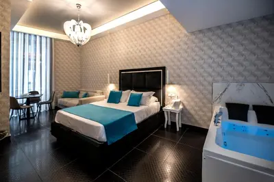 Letto o letti in una camera di Sole Luxury Bed and Breakfast