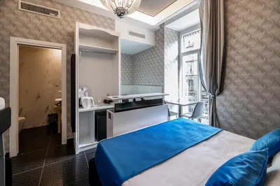 Letto o letti in una camera di Sole Luxury Bed and Breakfast