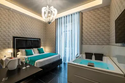 Letto o letti in una camera di Sole Luxury Bed and Breakfast