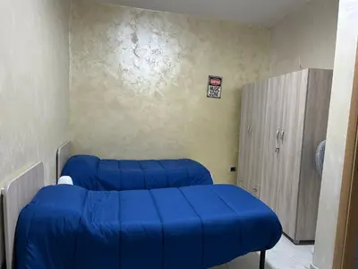 Letto o letti in una camera di la casa di vera