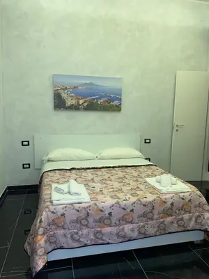 Letto o letti in una camera di Savastano house