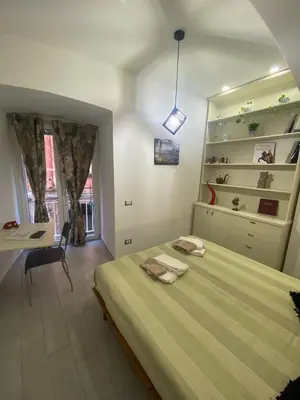 Letto o letti in una camera di ARTNAPOLI