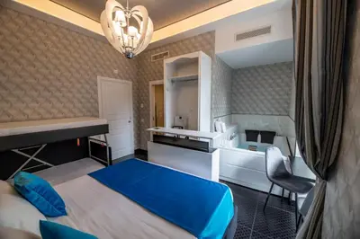 Letto o letti in una camera di Luna Luxury Bed and Breakfast