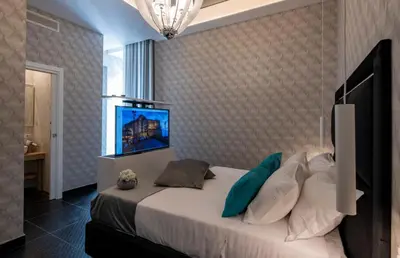 Letto o letti in una camera di Luna Luxury Bed and Breakfast