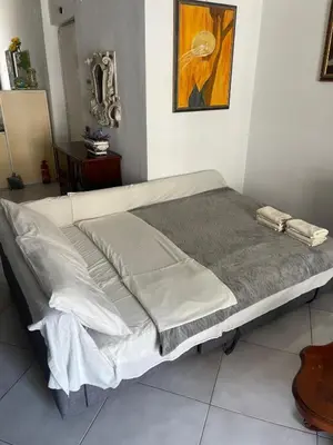 Letto o letti in una camera di Super Elegante Napoli Centro con posto auto e wifi veloce