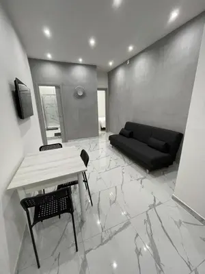TV o dispositivi per l'intrattenimento presso Rosa room luxury suite