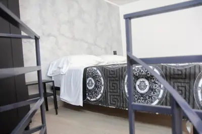 Letto o letti in una camera di LUXURY HOME VALENTINO