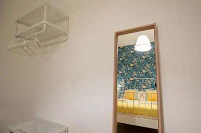 Letto o letti in una camera di Casa Partenope