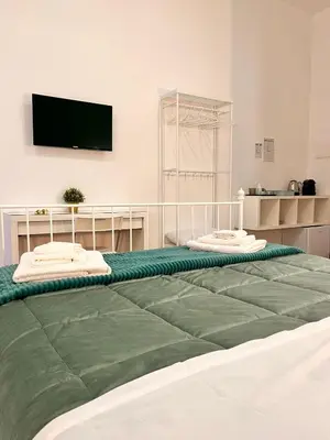 Letto o letti in una camera di La Dimora Del Principe