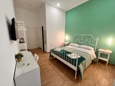 Letto o letti in una camera di La Dimora Del Principe