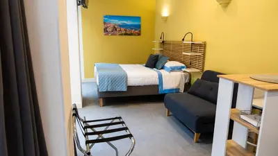 Letto o letti in una camera di Real Passeggio di Napoli