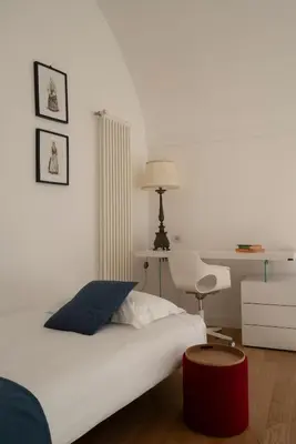 Letto o letti in una camera di A.RI.EL luxury apartment