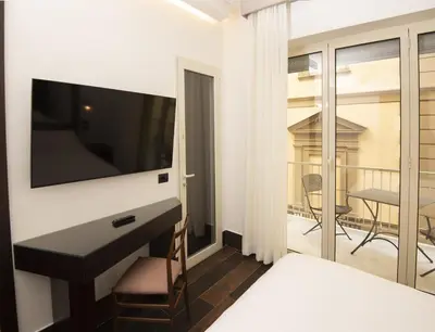 Letto o letti in una camera di Domus Altana