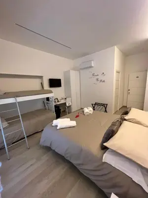 Letto o letti in una camera di K-Home