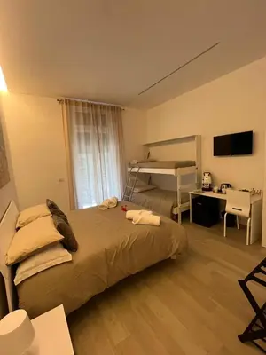 Letto o letti in una camera di K-Home