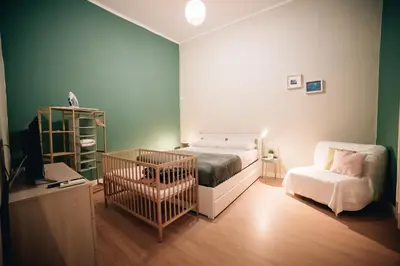 Letto o letti in una camera di DoHome Napoli