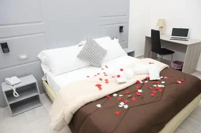 Letto o letti in una camera di Albergo Casablanca