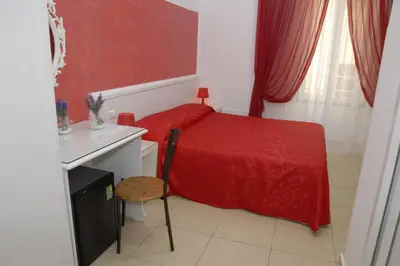 Letto o letti in una camera di Albergo Casablanca